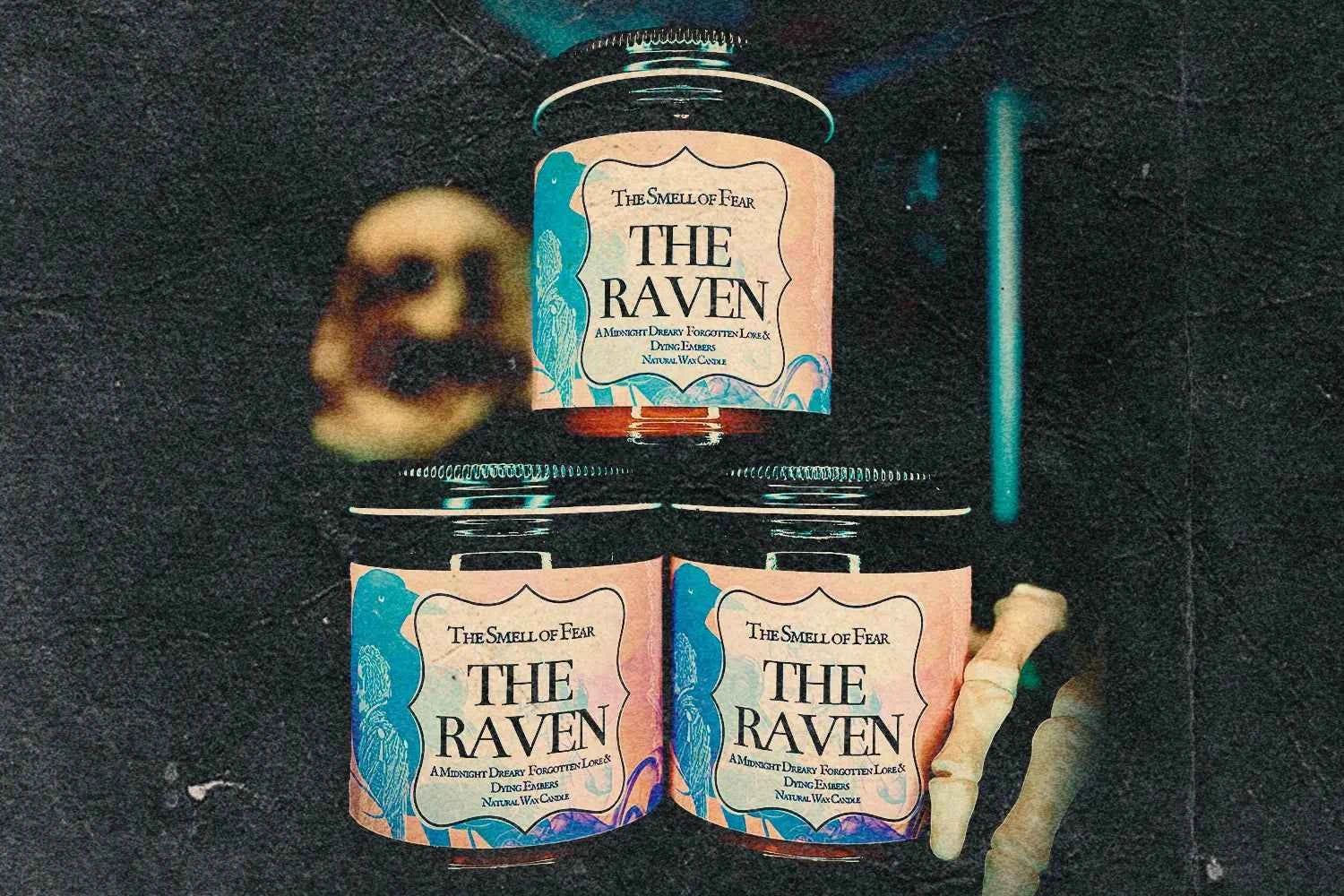 Three gothic horror candles labeled The Raven with eerie hand and ghostly background